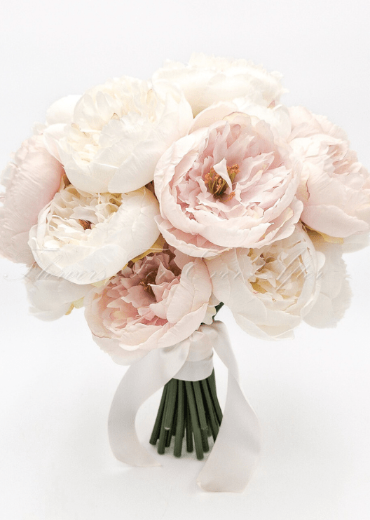 Artificial wedding bridesmaid posy with white and pale blush faux peonies and green leaves. Made in Melbourne by Flowers For Ever After, shipping Australia and Worldwide.