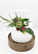 Artificial wedding cake flower pieces with white faux waratah and native-style foliage. For birthday, event and celebration cakes. Made in Melbourne by Flowers For Ever After, shipping Australia and Worldwide.