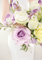 Artificial wedding bouquet detail showing lilac faux rose petals, white blooms and small white flowers. Made in Melbourne by Flowers For Ever After, shipping Australia and Worldwide.