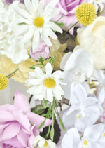 Artificial wedding arbor flower detail showing white faux daisies with yellow centres, white orchids, lilac rose petals and yellow pompom flowers. Made in Melbourne by Flowers For Ever After, shipping Australia and Worldwide.