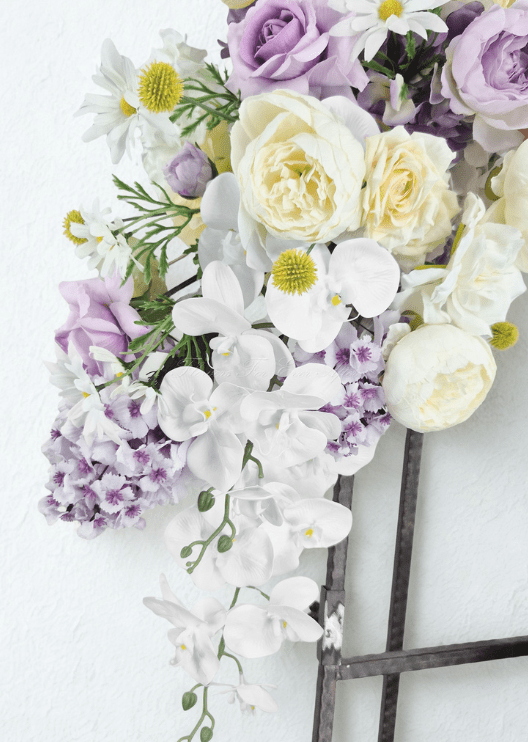 Artificial wedding hanging floral detail with white faux orchids, cream and lilac roses, white daisies, lilac filler flowers and yellow pompom blooms. Made in Melbourne by Flowers For Ever After, shipping Australia and Worldwide.