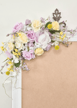 Artificial wedding sign flower detail with lilac, cream and yellow faux roses, yellow pompom flowers and fine branching stems. Made in Melbourne by Flowers For Ever After, shipping Australia and Worldwide.