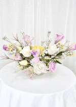 Artificial wedding table centrepiece with white, lilac and yellow faux roses, small lilac blossoms and fine white sprigs. Made in Melbourne by Flowers For Ever After, shipping Australia and Worldwide.