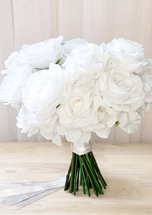 Artificial wedding bridal bouquet, reverse view of white faux roses, white peonies and ivory ribbon-wrapped stems. Made in Melbourne by Flowers For Ever After, shipping Australia and Worldwide.