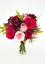Artificial wedding bridesmaid bouquet with pink and burgundy faux roses, red carnations, narrow green leaves and burgundy-wrapped stems. Made in Melbourne by Flowers For Ever After, shipping Australia and Worldwide.
