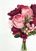 Artificial wedding bouquet close-up with pink and burgundy faux roses, tiny pink blossoms, narrow green sprigs and burgundy-wrapped stems. Made in Melbourne by Flowers For Ever After, shipping Australia and Worldwide.