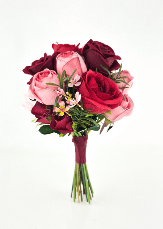 Artificial wedding small hand-tied bouquet with red, burgundy and pink faux roses, tiny pink blossoms and burgundy-wrapped stems. Made in Melbourne by Flowers For Ever After, shipping Australia and Worldwide.