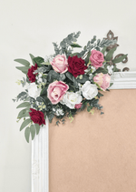 Artificial wedding sign floral spray, closer view of burgundy, pink and white faux roses and eucalyptus. Made in Melbourne by Flowers For Ever After, shipping Australia and Worldwide.