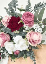 Artificial wedding sign flower close-up with burgundy, pink and white faux roses, tiny white flowers and rounded eucalyptus. Made in Melbourne by Flowers For Ever After, shipping Australia and Worldwide.