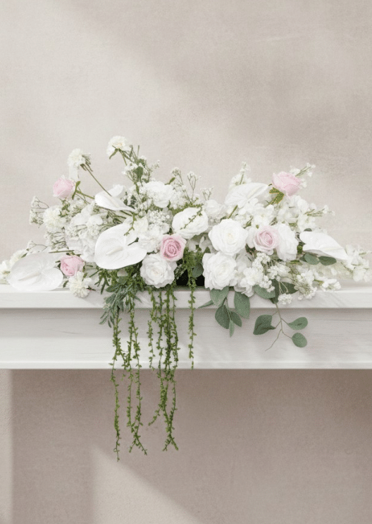 Artificial wedding long table garland with pale pink and white faux roses, clustered white flowers and green foliage. Made in Melbourne by Flowers For Ever After, shipping Australia and Worldwide.