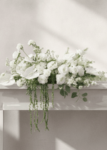 Artificial wedding long table garland with white faux roses, clustered white flowers and trailing green foliage. Made in Melbourne by Flowers For Ever After, shipping Australia and Worldwide.