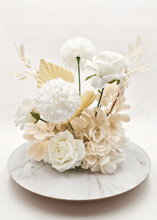 Artificial wedding table arrangement, front view of white faux roses, hydrangea and green foliage. Made in Melbourne by Flowers For Ever After, shipping Australia and Worldwide.