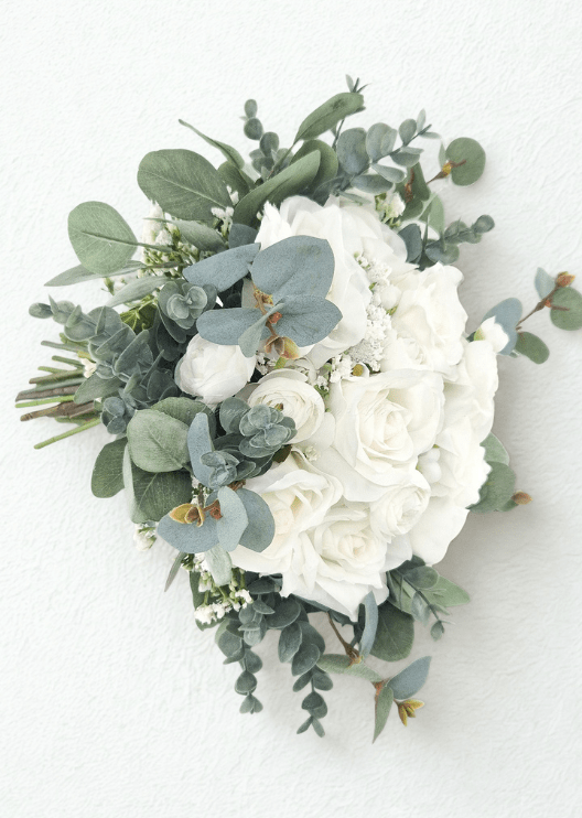 Artificial wedding bridal bouquet, rear view showing eucalyptus leaves, white faux rosebuds and ribbon-wrapped stems. Made in Melbourne by Flowers For Ever After, shipping Australia and Worldwide.