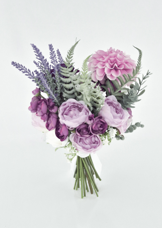 Artificial wedding bridesmaid bouquet, reverse view of lilac faux roses, pink dahlia, lavender-like sprigs and green fern-like foliage. Made in Melbourne by Flowers For Ever After, shipping Australia and Worldwide.