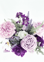 Artificial wedding bouquet, overhead view of lilac and purple faux roses, pink dahlias, white blooms and tall purple sprigs. Made in Melbourne by Flowers For Ever After, shipping Australia and Worldwide.