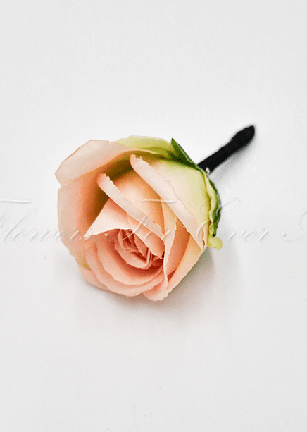 Artificial wedding boutonniere, angled view of an apricot faux rose, pale flowers and green foliage. For formals, proms and ball occasions. Made in Melbourne by Flowers For Ever After, shipping Australia and Worldwide.