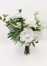 Artificial wedding bridal bouquet, reverse view of white faux roses, round white blooms and long green leaves. Made in Melbourne by Flowers For Ever After, shipping Australia and Worldwide.