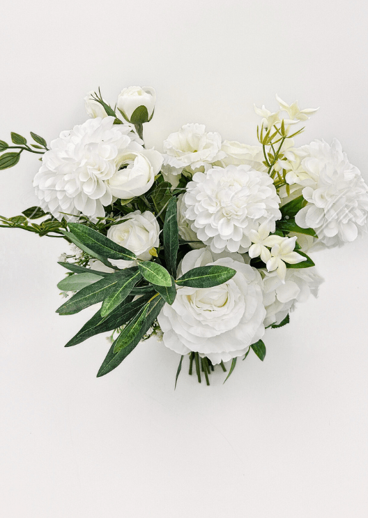 Artificial wedding bridal bouquet, angled view of white faux roses, round white blooms and branching greenery. Made in Melbourne by Flowers For Ever After, shipping Australia and Worldwide.