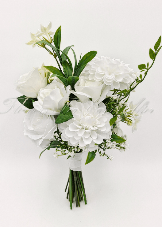 Artificial wedding bridesmaid bouquet with white faux roses, round white blooms, small white flowers and branching green foliage. Made in Melbourne by Flowers For Ever After, shipping Australia and Worldwide.