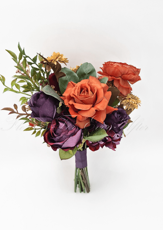 Artificial wedding boutonniere, angled view of an orange faux bloom and green foliage. For formals, proms and ball occasions. Made in Melbourne by Flowers For Ever After, shipping Australia and Worldwide.
