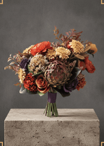 Artificial wedding bridal bouquet with warm orange and yellow faux flowers, burgundy blooms, greenery and trailing ribbon. Made in Melbourne by Flowers For Ever After, shipping Australia and Worldwide.