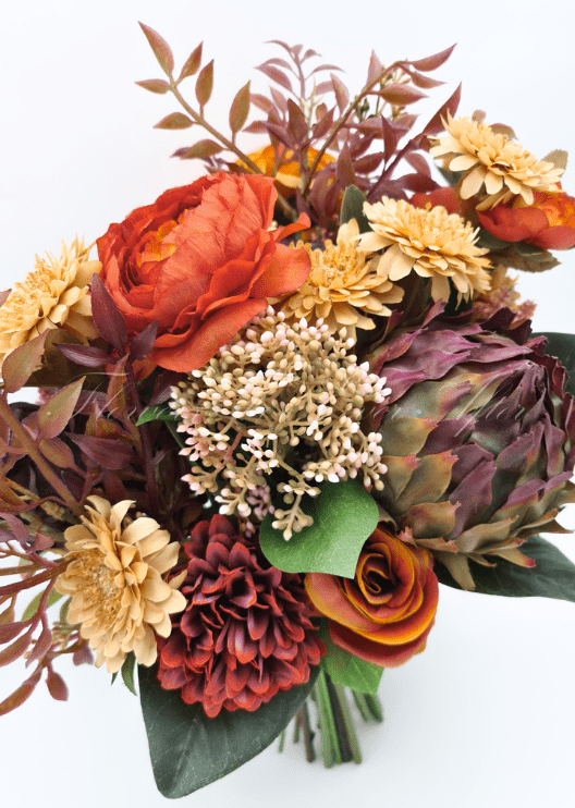 Artificial wedding bridal bouquet, front view of orange, yellow and burgundy faux blooms with autumn-toned foliage. Made in Melbourne by Flowers For Ever After, shipping Australia and Worldwide.