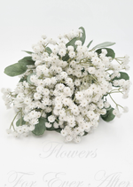 Artificial wedding bridesmaid posy, top view of densely clustered white faux baby's breath framed by grey-green leaves. Made in Melbourne by Flowers For Ever After, shipping Australia and Worldwide.