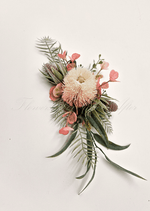 Artificial wedding cake decoration close-up with faux banksia flowers and native-style foliage. For birthday, event and celebration cakes. Made in Melbourne by Flowers For Ever After, shipping Australia and Worldwide.