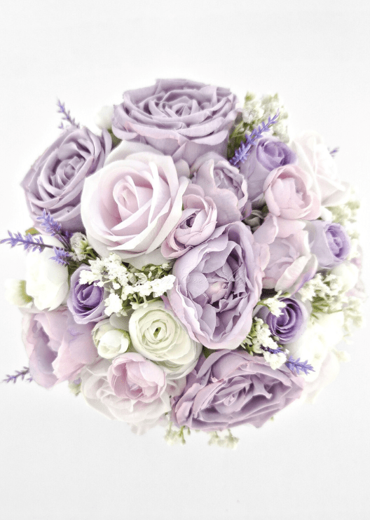 Artificial wedding bouquet, overhead view of lilac faux roses and peonies, ivory ranunculus and tiny white flowers. Made in Melbourne by Flowers For Ever After, shipping Australia and Worldwide.