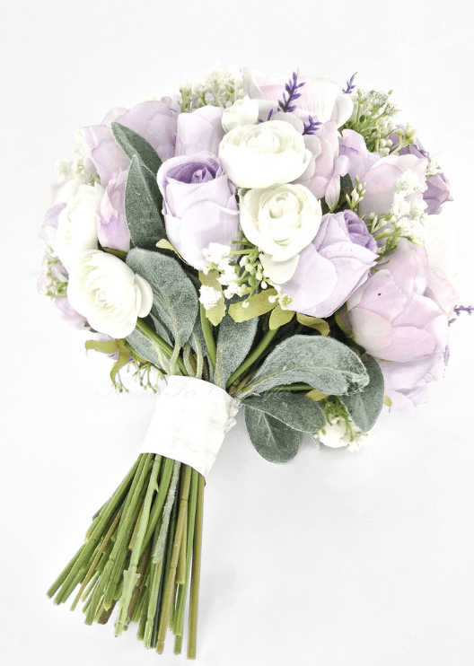 Artificial wedding bouquet, reverse view of lilac faux blooms, ivory ranunculus, grey-green leaves and gathered stems. Made in Melbourne by Flowers For Ever After, shipping Australia and Worldwide.