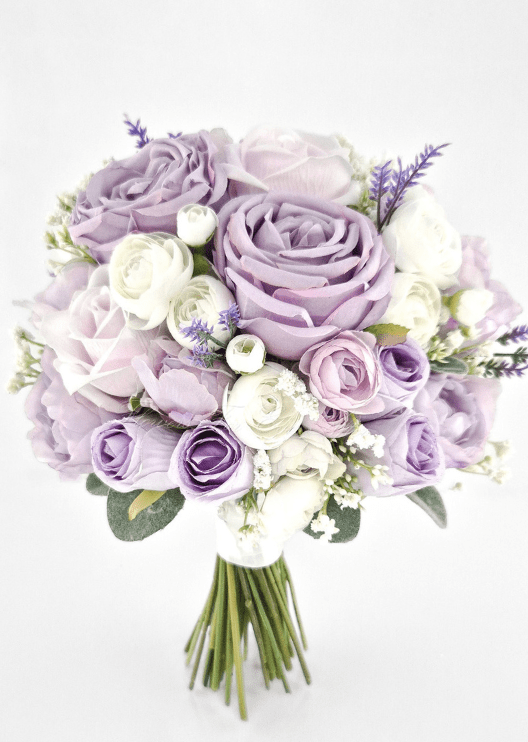 Artificial wedding bridal bouquet, angled view of lilac faux roses and peonies, ivory ranunculus and purple sprigs. Made in Melbourne by Flowers For Ever After, shipping Australia and Worldwide.