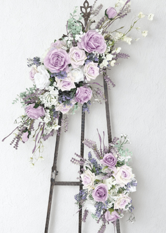 Artificial wedding angled arbor floral set with lilac and white faux roses, white orchids, purple flower spikes and eucalyptus. Made in Melbourne by Flowers For Ever After, shipping Australia and Worldwide.