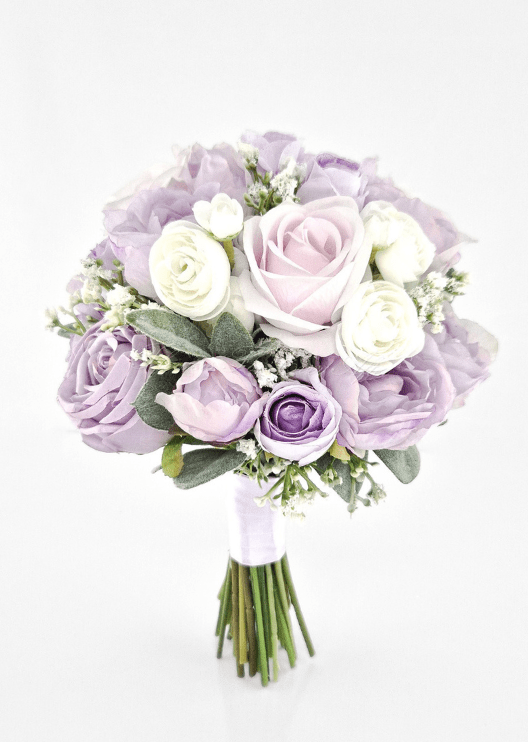 Artificial wedding bridesmaid bouquet with lilac faux roses and peonies, ivory ranunculus, white sprigs and lilac-wrapped stems. Made in Melbourne by Flowers For Ever After, shipping Australia and Worldwide.