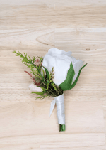 Artificial wedding boutonniere, rear view of a white faux rose, pale blush rosebud and green sprigs with ivory-wrapped stems. For formals, proms and ball occasions. Made in Melbourne by Flowers For Ever After, shipping Australia and Worldwide.