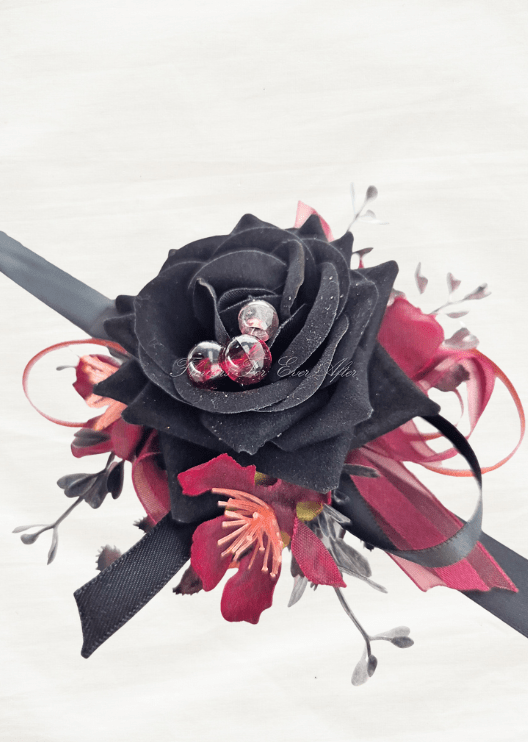 Artificial wedding wrist corsage close-up with a black faux rose, clear jewel accents, burgundy blossoms and black ribbons. For formals, proms and ball occasions. Made in Melbourne by Flowers For Ever After, shipping Australia and Worldwide.