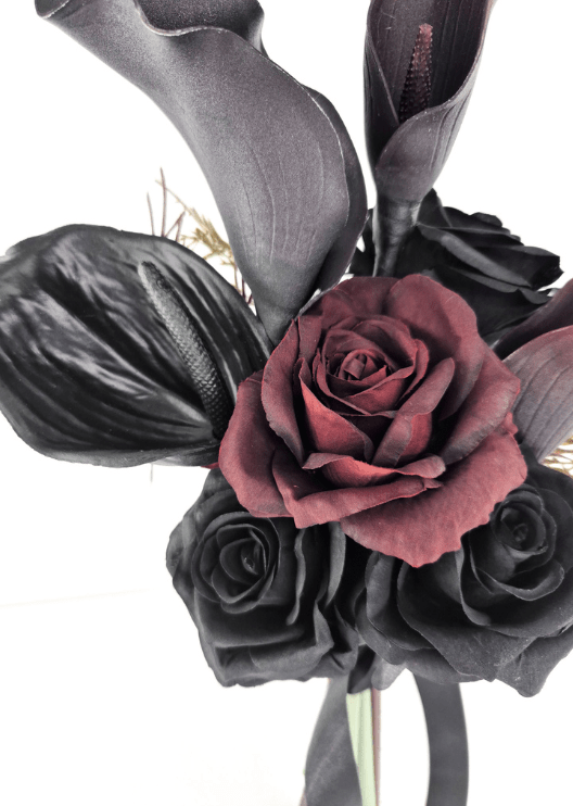 Artificial wedding bouquet close-up with a burgundy faux rose, black roses, black anthurium and dark calla lily petals. Made in Melbourne by Flowers For Ever After, shipping Australia and Worldwide.