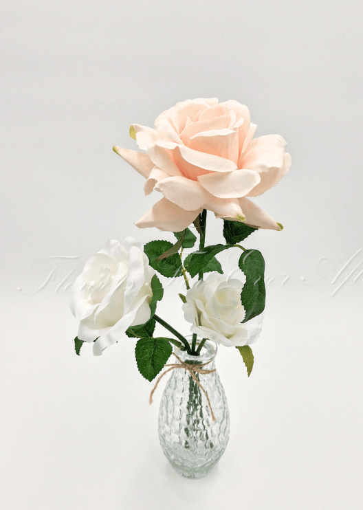 Artificial wedding table flower display with faux roses and small flowers arranged in clear glass containers. Made in Melbourne by Flowers For Ever After, shipping Australia and Worldwide.