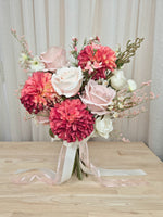 A faux flower bridal bouquet in different shades of pink and white.  Realistic vibrant dahlia, and soft blush pink roses.  Made in Melbourne Australia, by Australia's best online silk bridal florist