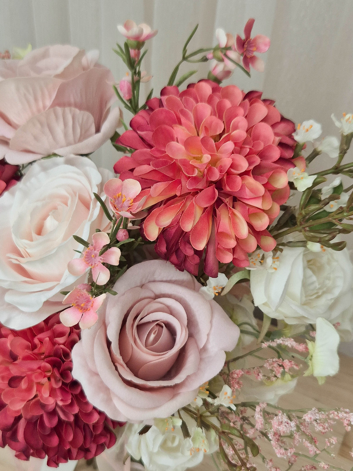 A faux flower bridal bouquet in different shades of pink and white.  Realistic vibrant dahlia, and soft blush pink roses.  Made in Melbourne Australia, by Australia's best online silk bridal florist