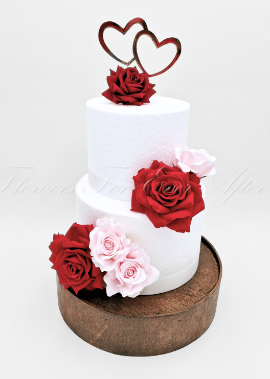 Artificial wedding cake flower set with mixed faux flowers and green leaves in separate floral clusters. For birthday, event and celebration cakes. Made in Melbourne by Flowers For Ever After, shipping Australia and Worldwide.