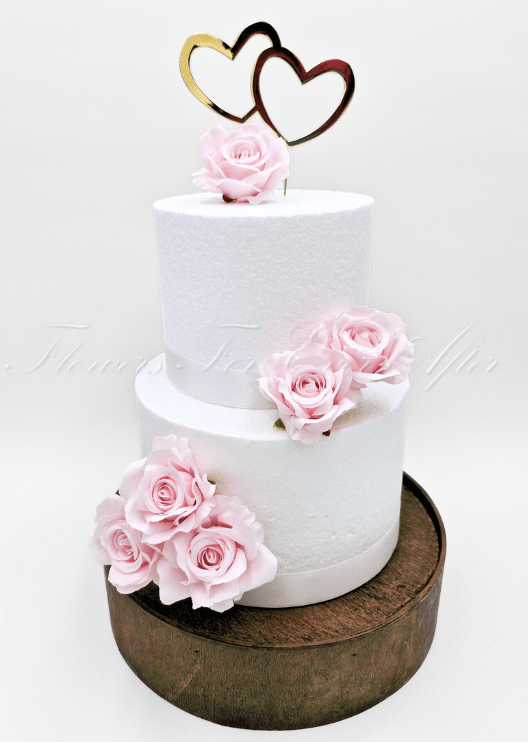 Artificial wedding cake decoration with faux roses arranged in clusters across the cake tiers. For birthday, event and celebration cakes. Made in Melbourne by Flowers For Ever After, shipping Australia and Worldwide.