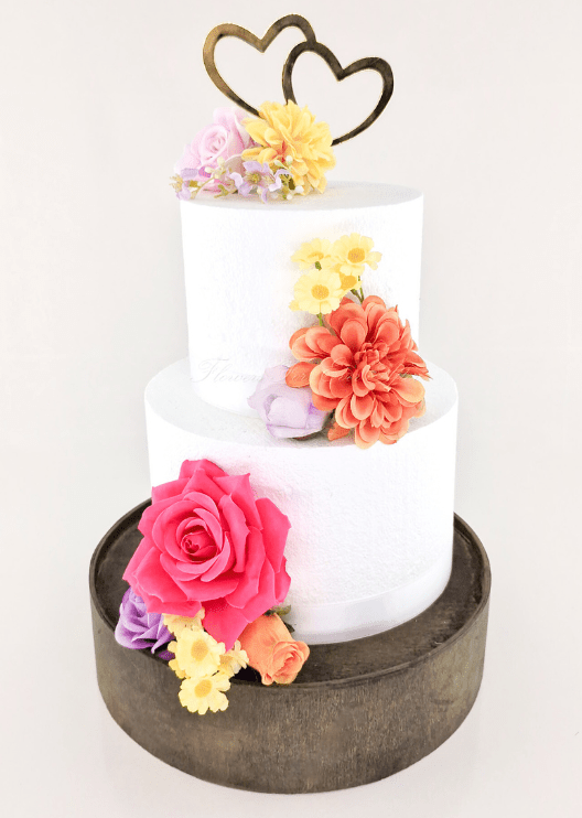 Artificial wedding cake flower decoration with faux rose clusters and green foliage. For birthday, event and celebration cakes. Made in Melbourne by Flowers For Ever After, shipping Australia and Worldwide.