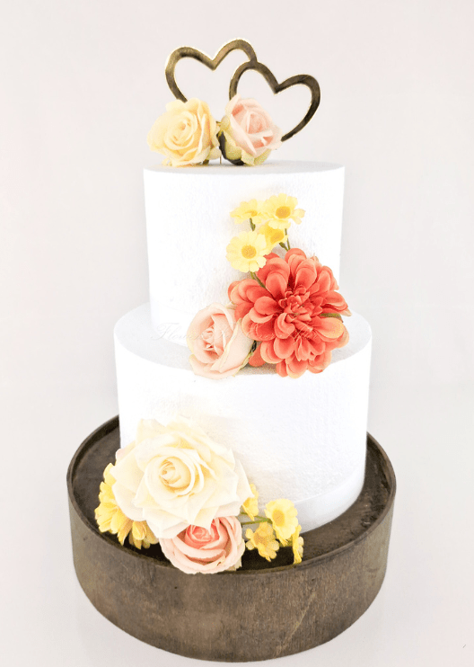 Artificial wedding cake decoration with faux roses arranged across two tiers. For birthday, event and celebration cakes. Made in Melbourne by Flowers For Ever After, shipping Australia and Worldwide.