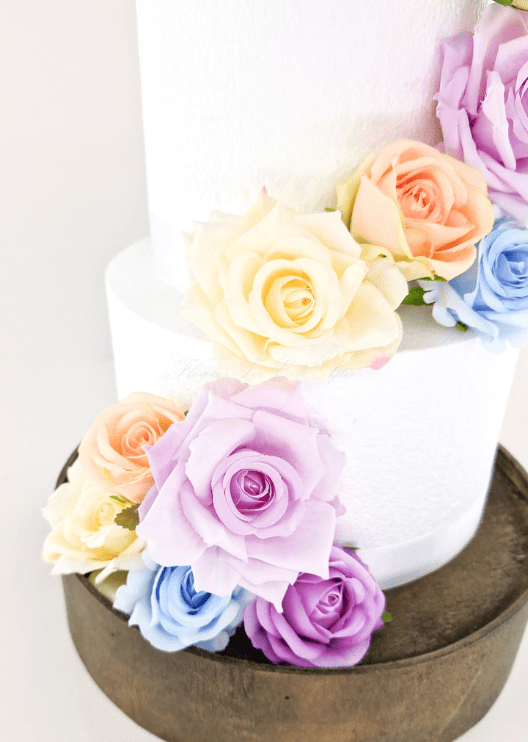 Artificial wedding cake flower close-up showing layered faux rose petals. For birthday, event and celebration cakes. Made in Melbourne by Flowers For Ever After, shipping Australia and Worldwide.