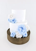 Artificial wedding cake decoration with light blue and white faux roses in upper and lower floral clusters. For birthday, event and celebration cakes. Made in Melbourne by Flowers For Ever After, shipping Australia and Worldwide.