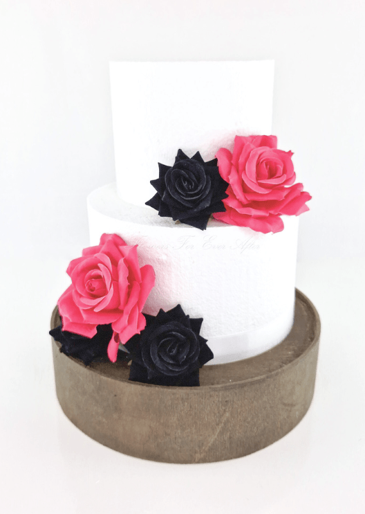 Artificial wedding cake decoration with faux flowers arranged in clusters across two tiers. For birthday, event and celebration cakes. Made in Melbourne by Flowers For Ever After, shipping Australia and Worldwide.