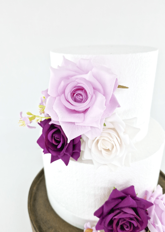 Artificial wedding cake floral close-up showing layered faux rose petals. For birthday, event and celebration cakes. Made in Melbourne by Flowers For Ever After, shipping Australia and Worldwide.