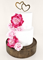 Artificial wedding cake decoration, angled view of blue and white faux roses across the tiers. For birthday, event and celebration cakes. Made in Melbourne by Flowers For Ever After, shipping Australia and Worldwide.