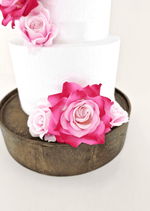 Artificial wedding cake decoration close-up with blue and white faux rose petals. For birthday, event and celebration cakes. Made in Melbourne by Flowers For Ever After, shipping Australia and Worldwide.