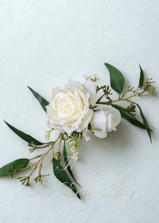 Artificial wedding cake flower set with white and dusty pink faux roses, pale berries and green sprigs in separate clusters. For birthday, event and celebration cakes. Made in Melbourne by Flowers For Ever After, shipping Australia and Worldwide.